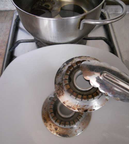 remove gas burner from water